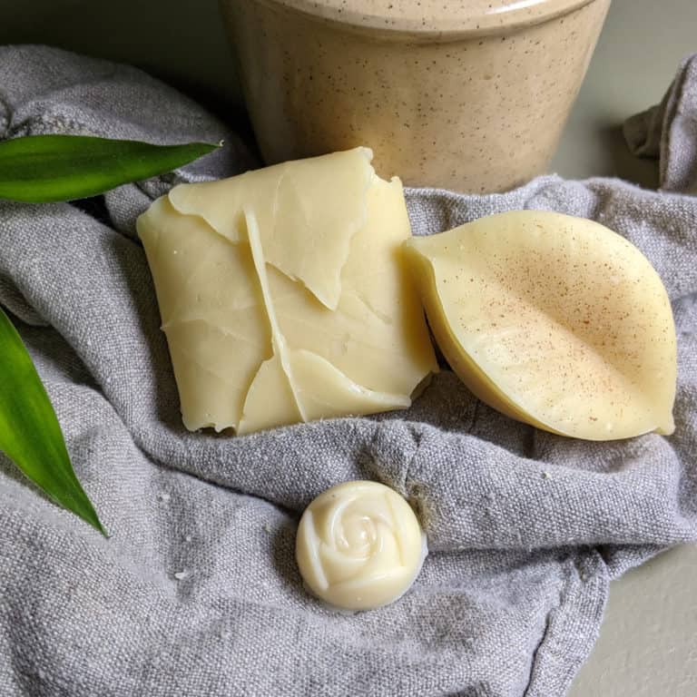Lassea solid conditioner bars on a towel.